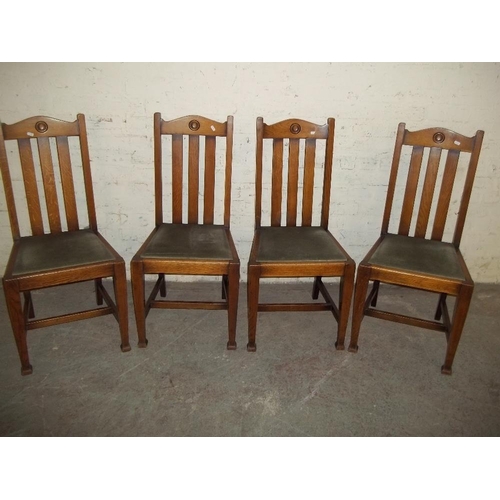 850 - A SET OF 4 OAK DINING CHAIRS