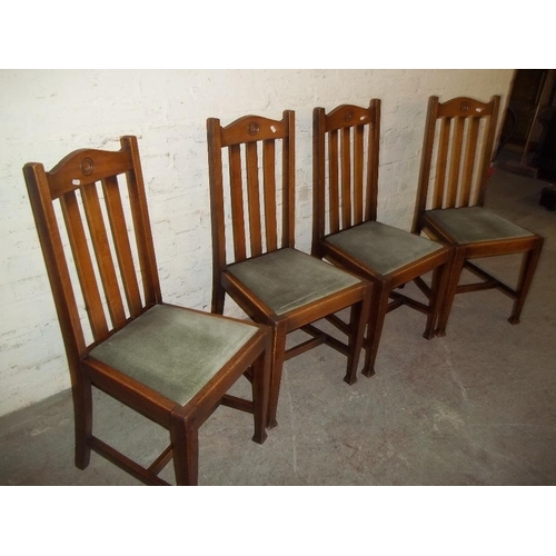 850 - A SET OF 4 OAK DINING CHAIRS