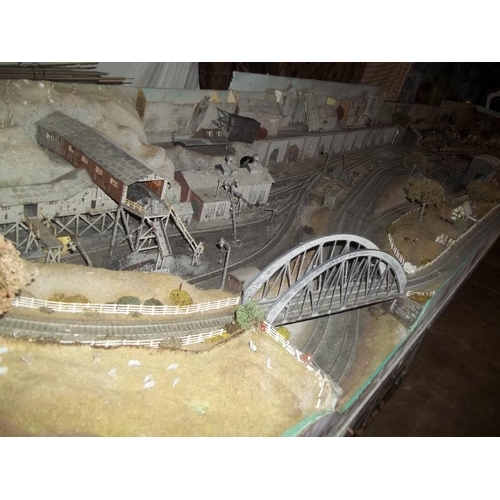 864 - A 20 FOOT SECTIONAL MODEL RAILWAY LAY OUT