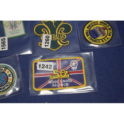 2 - A SMALL TRAY OF SEW ON SCOUT AND OTHER Badges, to include Australian and Canadian type examples,