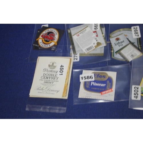 4 - A TRAY CONTAINING BEER MATS, AND BEER LABELS, together with a collection of assorted Tazo's etc