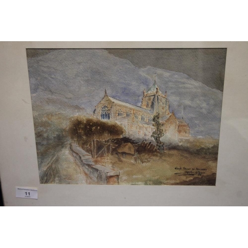 11 - A FRAMED AND GLAZED WATERCOLOUR OF A CHURCH SIGNED TO THE LOWER RIGHT