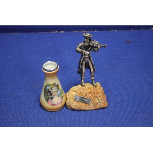 69 - AN ISSAC JEHSKEL FIGURE OF A FIDDLE PLAYER, MARKED 925, AND A VINTAGE SILVER TOP VASE (2)