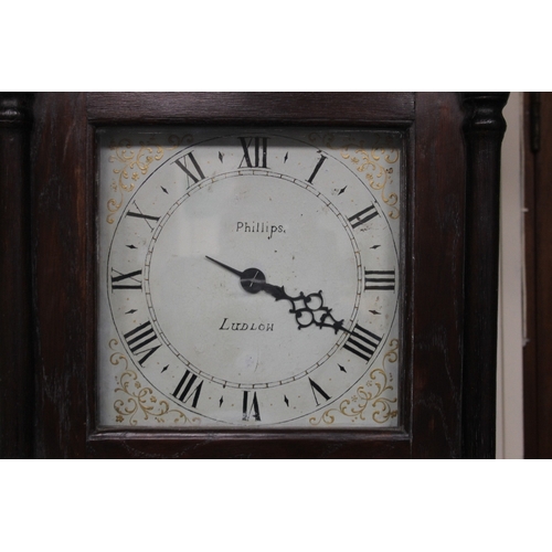 879 - AN OAK CASED GRANDFATHER CLOCK