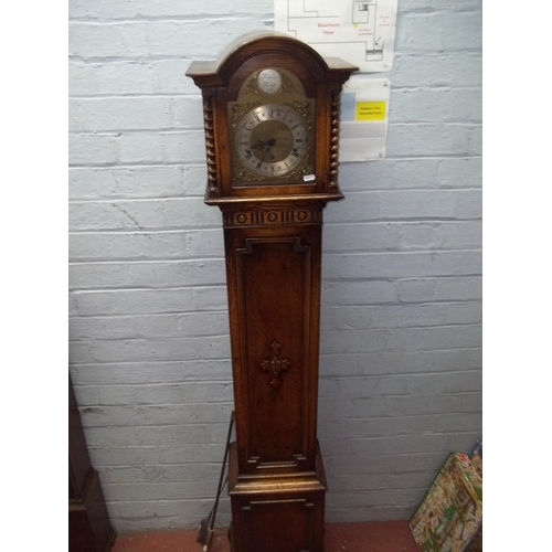 711 - AN OAK GRAND MOTHER CLOCK