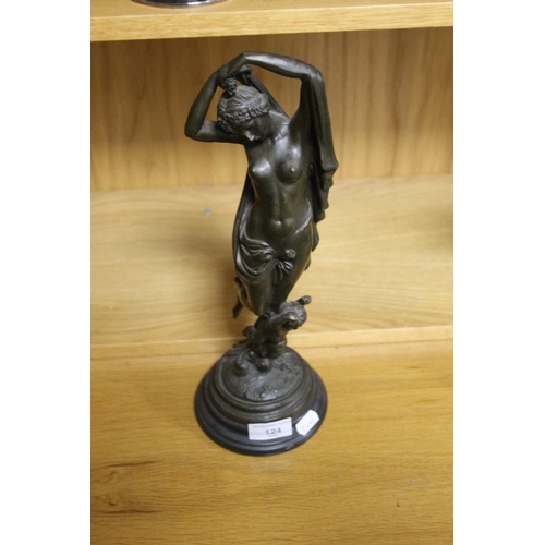 124 - A BRONZE TYPE FIGURE OF A LADY WITH A CHERUB