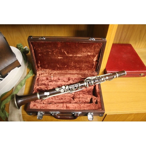 126 - AN ANTIQUE ROSEWOOD CLARINET A/F