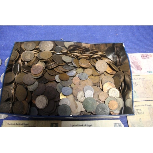 41 - A TIN OF COINS AND BANKNOTES