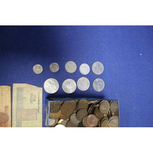 41 - A TIN OF COINS AND BANKNOTES