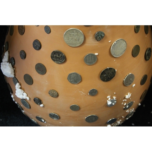 28 - A LARGE CASED VASE DECORATED WITH RARE FOREIGN COINS