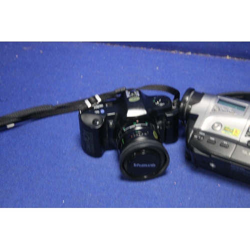 86 - A PANASONIC VIDEO CAMERA TOGETHER WITH AN OLYMPUS 35MM CAMERA