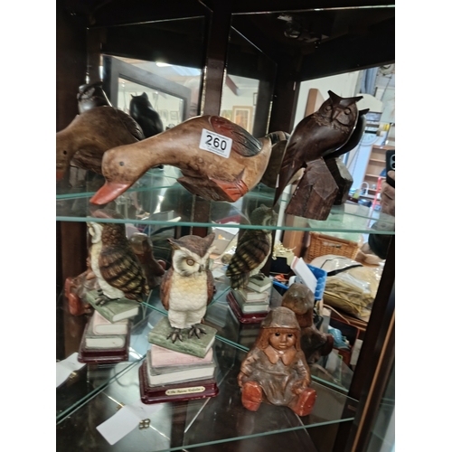 260 - 4 x Figures in Corner Cabinet