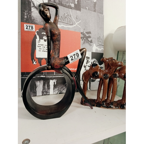 279 - Pair of Camels & Lady Figurines