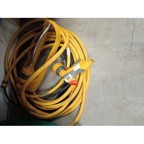 53 - Garden hose & sprinkler