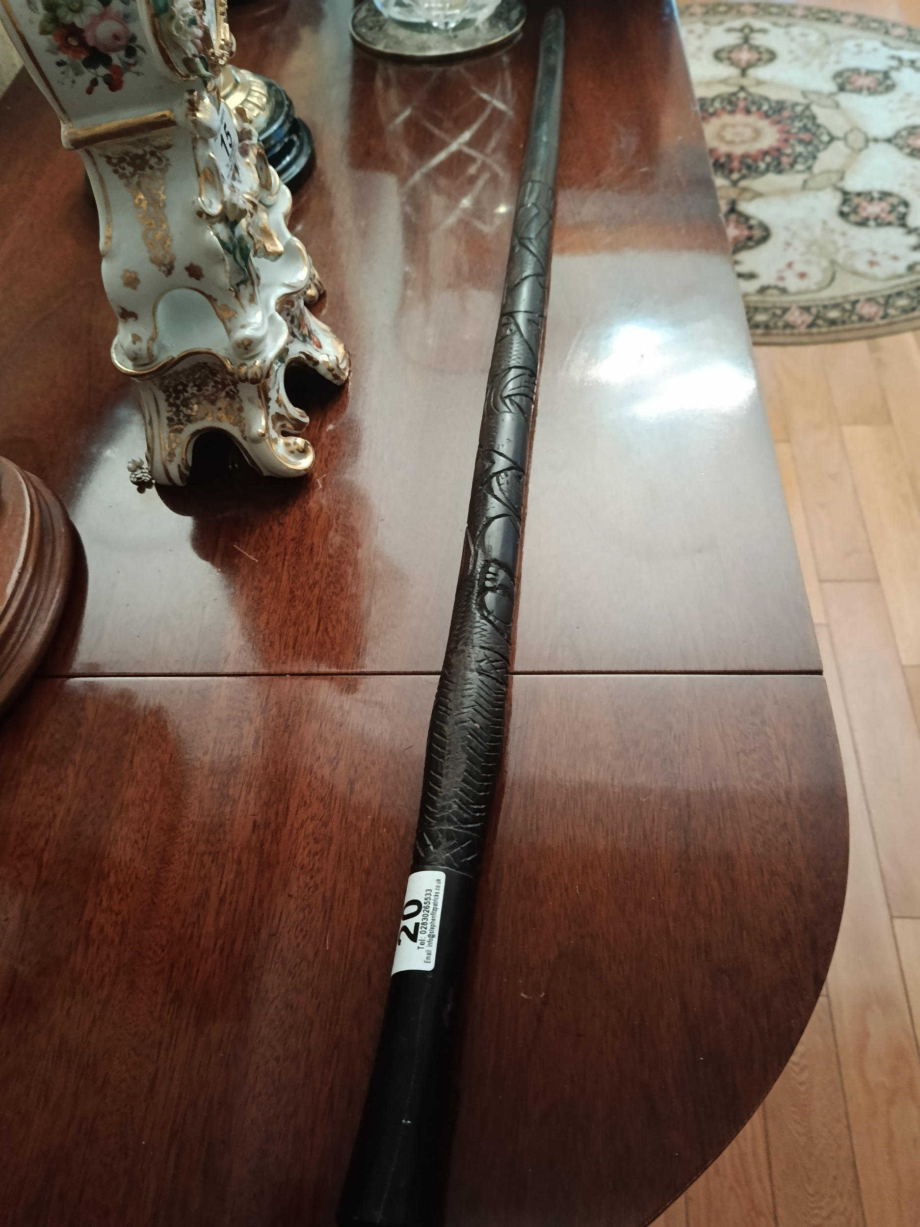 Highly carved ebony ceremonial baton
