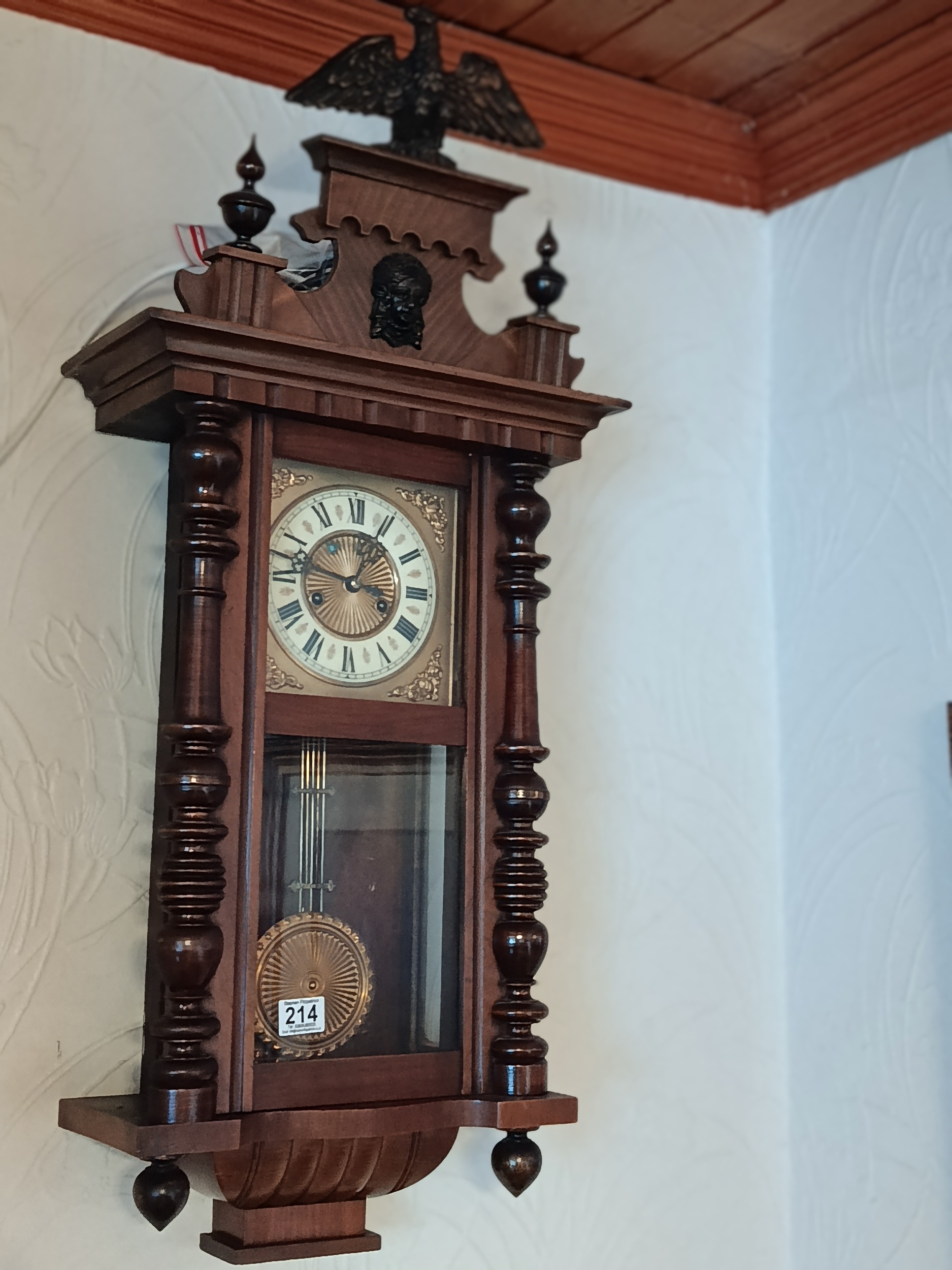 Vienna wall clock with eagle topped pediment, turn pillared sides ...