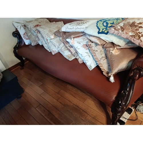Button back Victorian scroll end leather double ended sofa