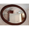 Mahogany oval mirror with pie crust edge
