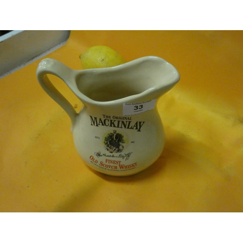 33 - OLD MACKINLEY SCOTCH WHISKY JUG