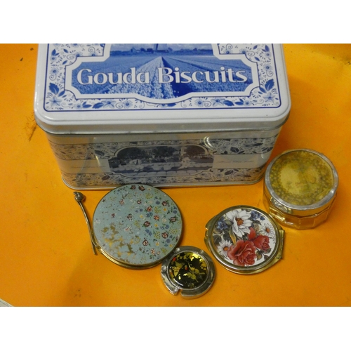 76 - COLLECTABLE GOUDA BISCUIT TIN CONTAINING VINTAGE COMPACTS ETC