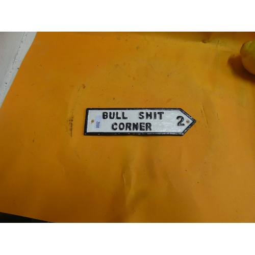 87 - BULL SHIT CORNER CAST IRON SIGN