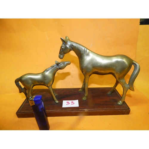 33 - BRASS MARE AND FOAL ON STAND