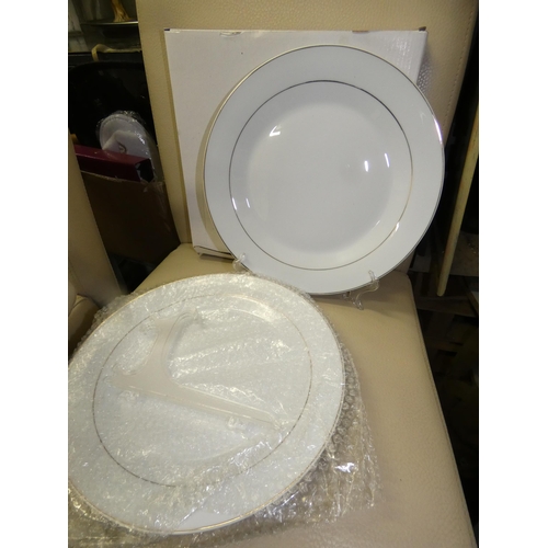 203 - 2 GILT EDDED WHITE PLATES WITH STANDS