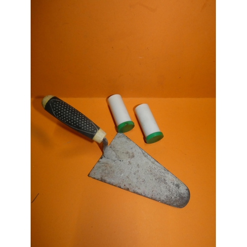OLD TROWEL; ABD RUBBER BULLET CASINGS