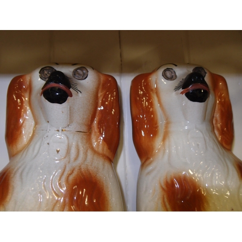 300 - PAIR OF MANTLE DOGS