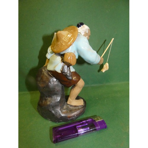 8 - JAPANESE CERAMIC FISHERMAN