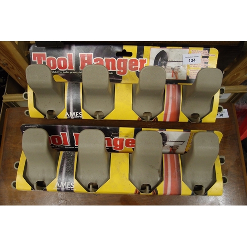 134 - 2 SETS OF TOOL HANGERS