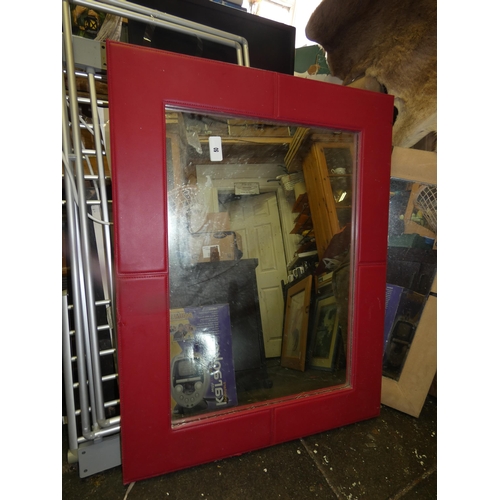 50 - RED LEATHER FRAMED MIRROR