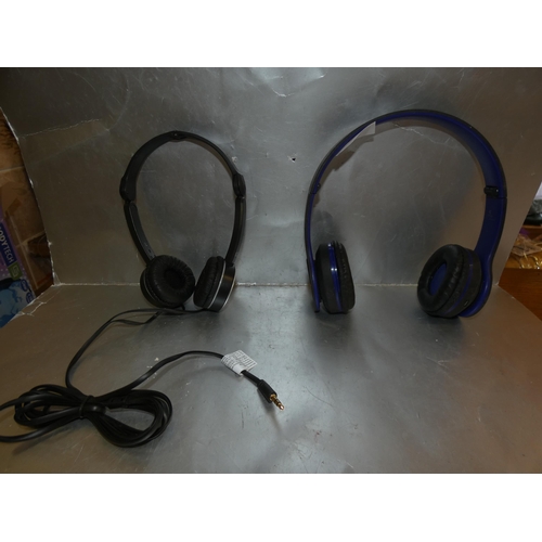 8 - PAIR OF HEADPHONES