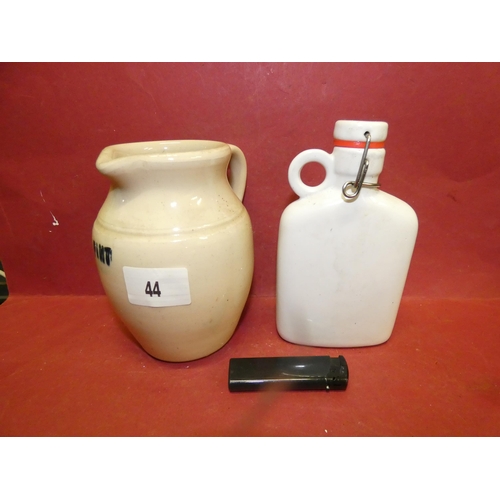 44 - IVORY POTTERY JUG AND CERAMIC BOTTLE