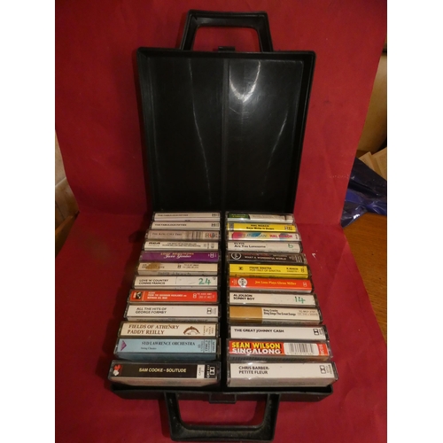 58 - QTY OF CASSETTES AND HOLDER