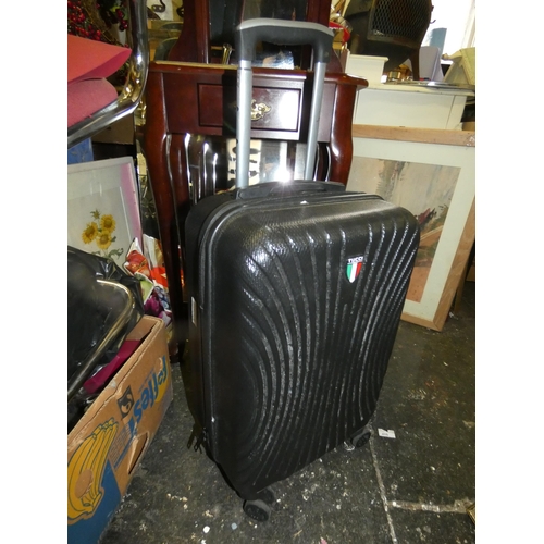 54 - POLYCARBON SUITCASE