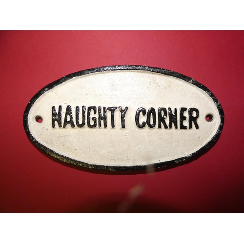 47 - CAST IRON NAUGHTY CORNER SIGN