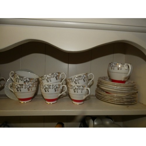 1 - SHELF LOT OF MIXED CHINA TEA PIECES, INC.STANLEY