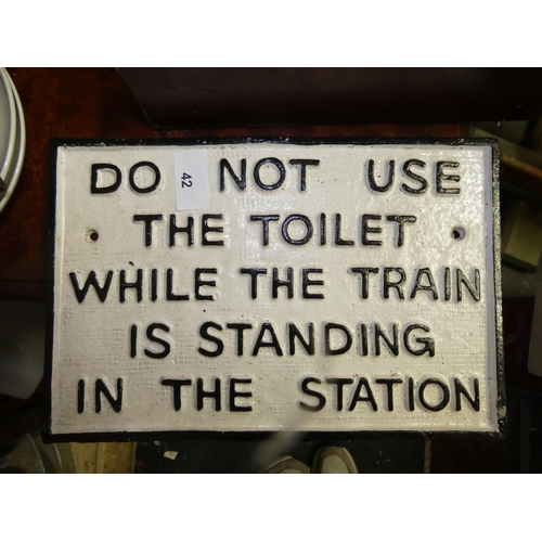 42 - CAST IRON SIGN