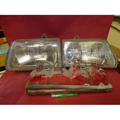 112 - PAIR OF OLD HEAD LIGHTS  FROM ANGLIA  CAR