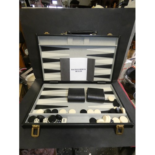 17 - 15'' BACKGAMMON SET IN A HANDMADE BLACK ATTACHE CASE