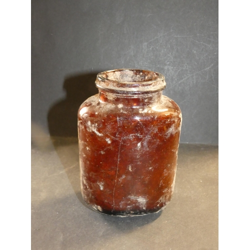 240 - ANTIQUE BROWN GLASS JAR