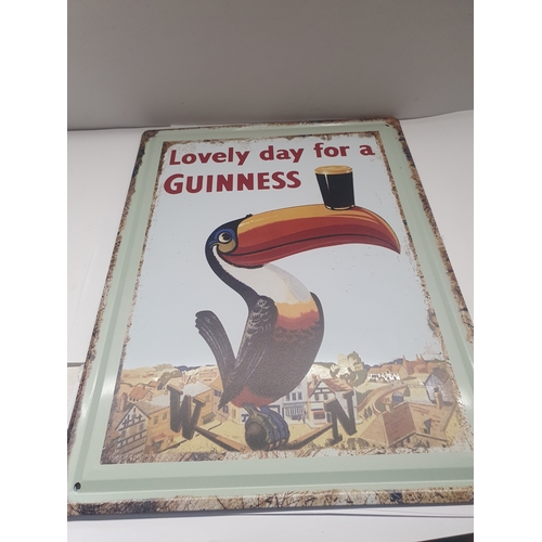 1048 - Large lovely day for Guinness tin sign