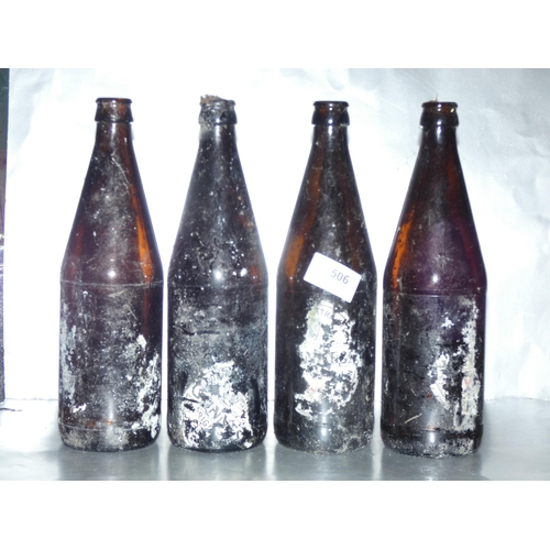 506 - 4 OLD GUINNESS BOTTLES