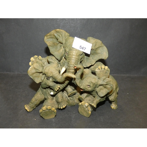 547 - RESIN FIGURINE  3 PLAYING ELEPHANTS