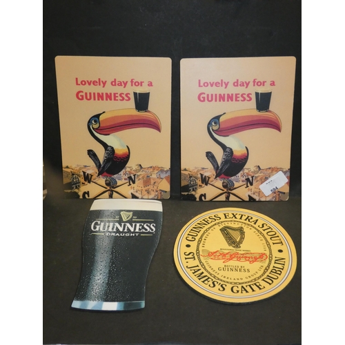 594 - 4 GUINNESS ADVERTS