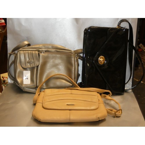 422 - THREE LADIES HANDBAGS