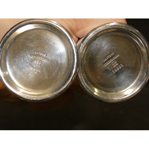 556 - SILVER PLATE SALT AND PEPPER SHAKERS