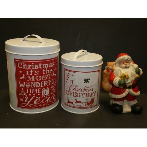 744 - TWO CHRISTMAS TINS AND SMALL SANTA CLAUS