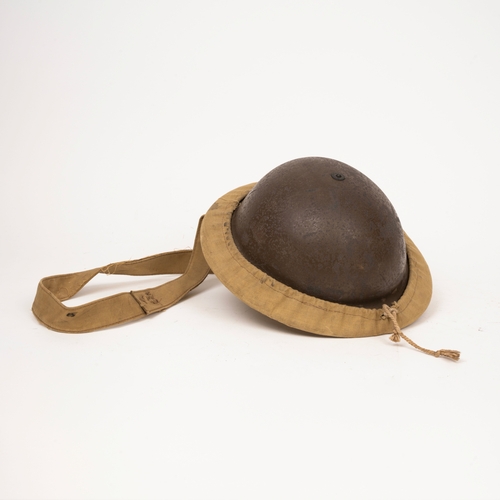 163 - WWII Home Front  steel helmet with home-made canvas carrying cover